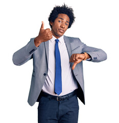 Poster - Handsome african american man with afro hair wearing business jacket doing thumbs up and down, disagreement and agreement expression. crazy conflict