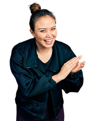 Sticker - Young hispanic girl wearing sportswear clapping and applauding happy and joyful, smiling proud hands together