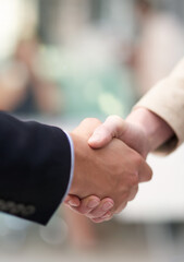 Poster - Business meetings. Shot of a coworkers shaking hands in an office.