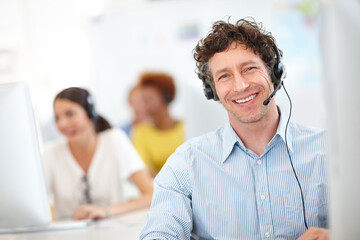 Poster - Were the call center you need. Cropped portrait of a handsome call center operator in the office.