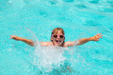 Fototapeta Łazienka - Kids summer vacation, swimming and relax. Children playing in the swimming pool. Summer activity.