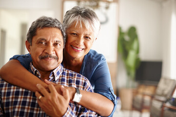 Sticker - Our love for each other will never grow old. Shot of a loving senior couple enjoying quality time together at home.