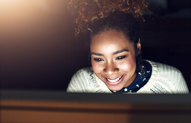 Poster - On night shift you make more money by the hour. Shot of a young businesswoman working late in her office.