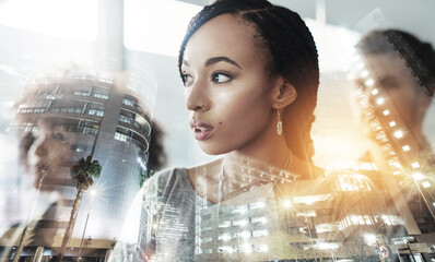 Canvas Print - Building their business on ambition and drive. Multiple exposure shot of businesspeople superimposed over a cityscape.