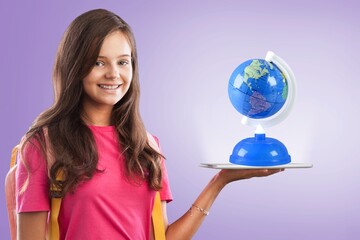 Canvas Print - Young student woman hold world globe