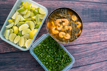 Bowl with green smell and tacaca lemon