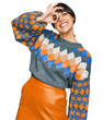 © Krakenimages.com - Young hispanic woman wearing casual clothes smiling happy doing ok sign with hand on eye looking through fingers