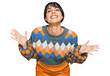 © Krakenimages.com - Young hispanic woman wearing casual clothes celebrating mad and crazy for success with arms raised and closed eyes screaming excited. winner concept
