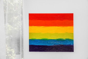 Poster - Painting of LGBT flag on light wall in room