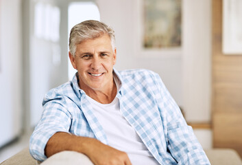 Poster - Having a relaxing day at home. Cropped shot of a mature man relaxing on his sofa at home.