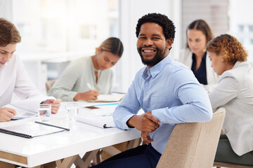 Wall Mural - Happy black man, portrait and business meeting with team, management and staff in office for company workshop. Smile, motivation and male worker in startup, collaboration and corporate opportunity