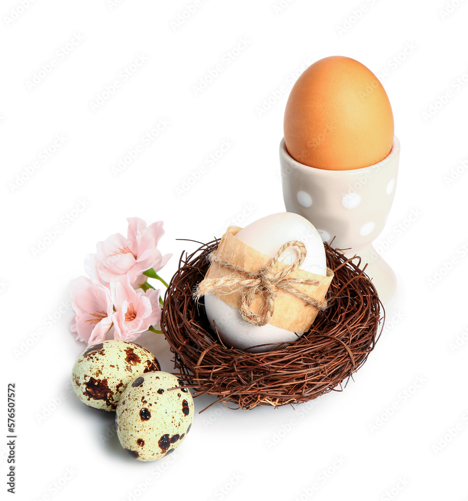 Easter eggs and sakura flowers isolated on white background