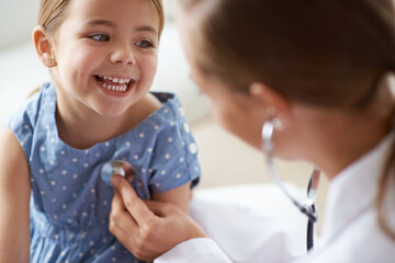 Canvas Print - That tickles. Cropped shot of an adorable young girl with her pediatrician.