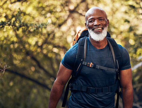 happy, hiking and portrait of black man in forest for freedom, health and sports training. exercise,