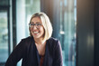 © Laflor/peopleimages.com - Bringing positive energy to the workplace. Shot of a happy businesswoman in a modern office.