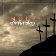 Image of holy saturday text over clouds and crosses