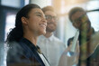 © Lucinda D B/peopleimages.com - Brainstorming theyre way to success. Shot of a group of colleagues brainstorming together on a glass wall in an office.