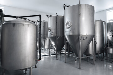 interior of a modern factory brewery with tanks inside