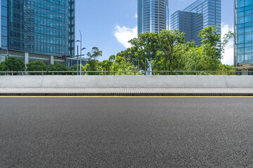 empty asphalt road with city skyline background in china.