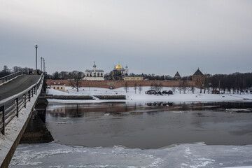 Wall Mural - old stone church in the old center in Veliky Novgorod on a winter day