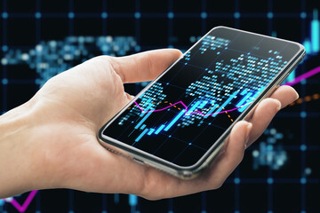 Poster - Close up of female hand holding cellphone with glowing candlestick forex chart map hologram on dark background. Trade and market concept.