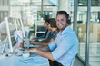 © AS/peopleimages.com - Delivering outstanding customer support day after day. Portrait of a happy and confident young man working in a call center.