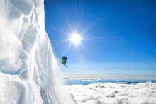 Airborne Skier Flies Above Clouds