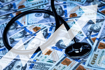 Wall Mural - Stethoscope on the background of one hundred dollar bills.