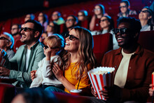 Happy Audience In 3D Movie Theater.