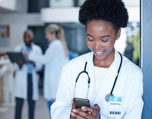 Poster - Black woman, doctor and smile with phone in hospital on telehealth app, internet search and connection. Happy medical worker typing on smartphone technology for contact, reading online chat or clinic