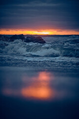 Wall Mural - Waves at the danish shore at late sunset. High quality photo