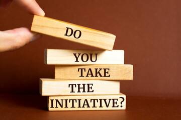 Wall Mural - Wooden blocks with words 'Do You Take The Initiative?'. Business concept