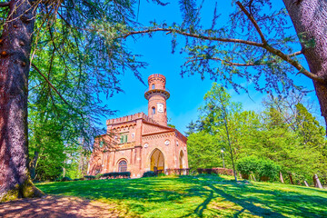 Wall Mural - Monza Royal Gardens with medieval Torretta Viscontea building among greenery, Italy