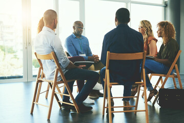 Aufkleber - We aim to do something creative everyday. Shot of a group of diverse creative employees having a meeting inside.