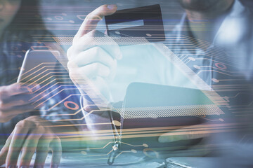 Fototapete - Double exposure of man and woman on-line shopping holding a credit card and data theme hologram drawing. Ai and E-commerce pay on-line concept.