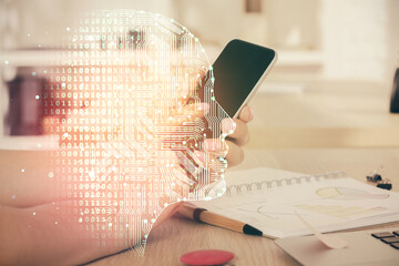 Fototapete - Double exposure of man's hand holding and using a digital device and brain hologram drawing. Data concept.