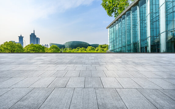 empty square floor and city skyline with modern buildings in shanghai, zhejiang province, china.