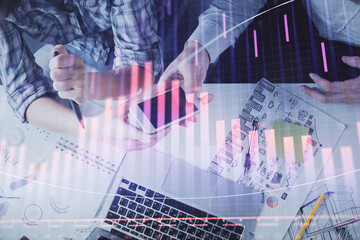 Poster - Double exposure of forex graph drawing and man and woman working together holding and using a mobile device. Trade concept.