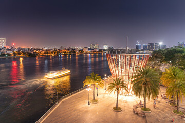 Beautiful night view with colorful sky at Landmark 81 - it is a super tall skyscraper with development buildings along Saigon river in Ho Chi Minh city, Vietnam.