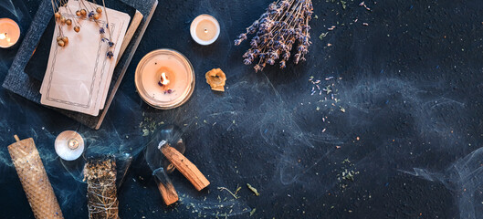 tarot, astrology,esoteric, occult mystical ritual scene of sorcery tarot candles,dried flowers, palo