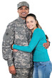 © BillionPhotos.com - Smiling soldier with his wife standing against white background