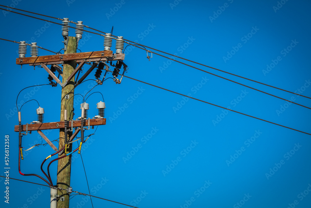 Electrical distribution lines from the power plant to the home customer