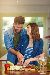 Poster - Creating a healthy home and a happy marriage. Shot of a happy young couple preparing a healthy meal together at home.