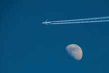 Airplane On The Background Of The Moon