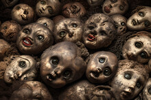 Creepy Old Doll Heads, Scary Baby Doll Faces. Close Up, Grunge Horror Background.