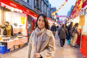 Canvas Print - Woman go Dihua street in Taipei at night at the period of Chinese New Year