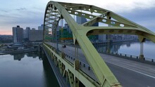 Fort Pitt Bridge With Pittsburgh Skyline In Background. Aerial Reveal.