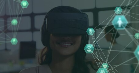 Poster - Animation of network of connections with icons over african american woman using vr headset