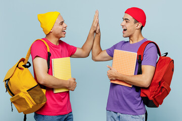 young students couple two friends men wearing casual clothes backpack bag together holding books giv
