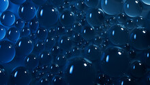Liquid Drops On Blue Background. Macro Wallpaper.